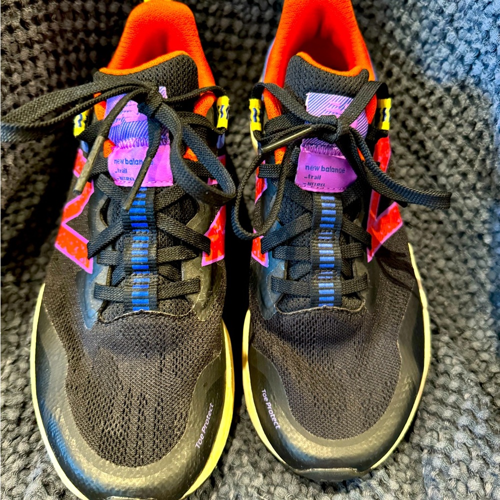New balance tennis shoes, size 8, and multiple colors.